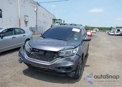2015 Honda Cr-V Touring z USA, uszkodzony, nr VIN 5J6RM4H97FL125455